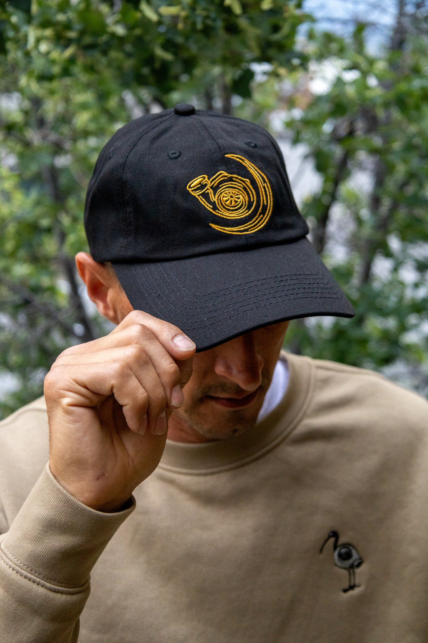 Model wearing Lucid Auto Company Logo Dad Hat – unisex car enthusiast hat