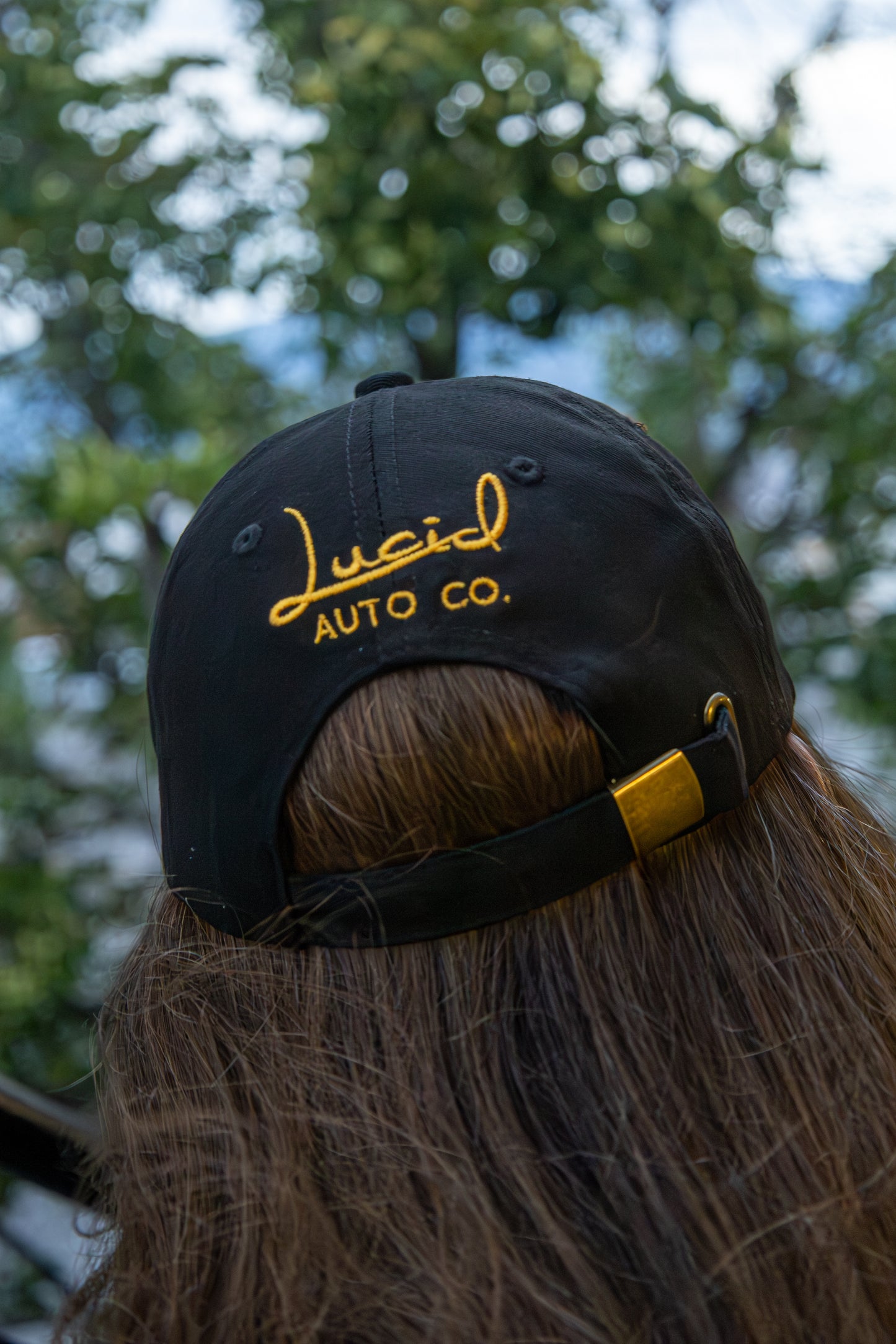 Close-up of embroidery on Lucid Dad Hat – car culture accessory