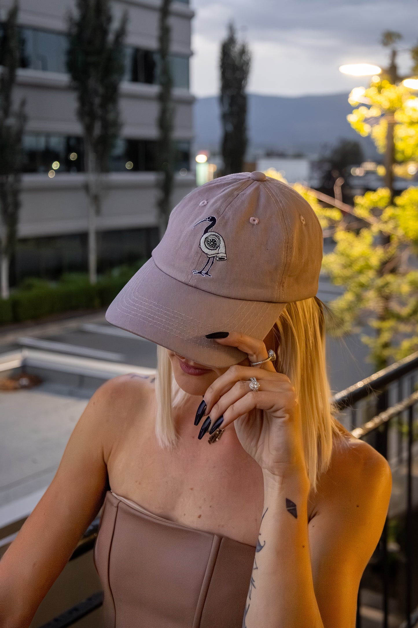 Close-up of turbo bin chicken embroidery on dad hat – automotive streetwear accessory